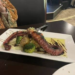 Octopus was grilled and unbelievably good.
