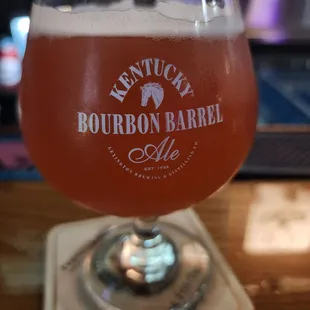 a glass of bourbon barrel ale