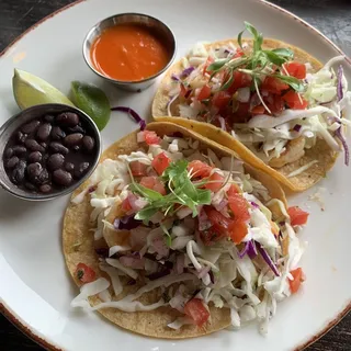 Seared Jerk Spiced Rubbed Shrimp Tacos.