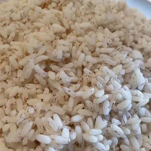 cooked rice in a white bowl