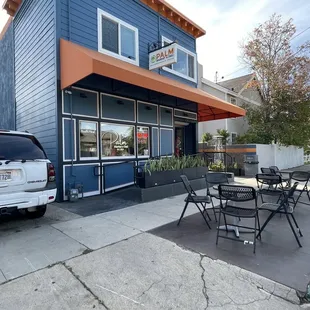 Three small tables outside