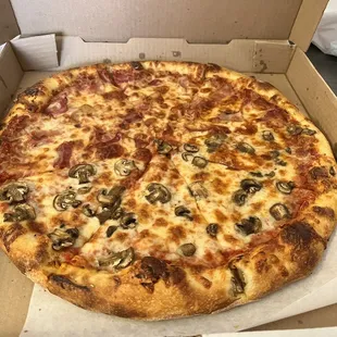 a pizza in a pizza box