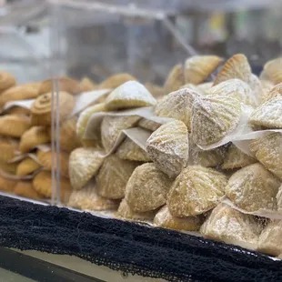 Ma'moul - stuffed with nuts (foreground) and stuffed with dates (background)
