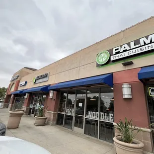 Neighboring strip mall businesses.