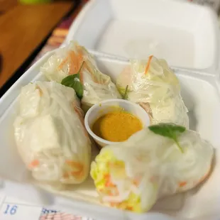 Fresh rolls with peanut sauce.
