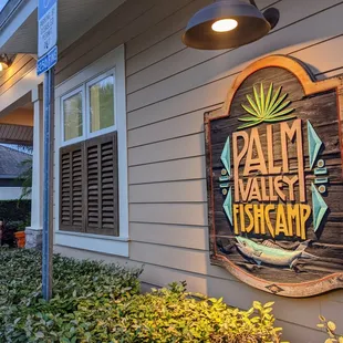 Outside. Storefront sign.