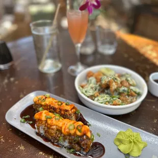 Lion king maki roll and popcorn chicken with snow seasoning jalapeño (not very spicy)