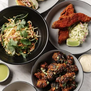 a variety of dishes of food on a table