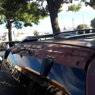 The ENTIRE 3rd brake light roof mount was torn off by the hanging blow dryer inside of the car washing machine.