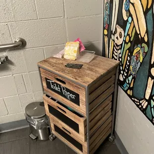 a wooden crate with a sign on it