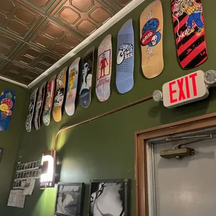skateboards on the wall