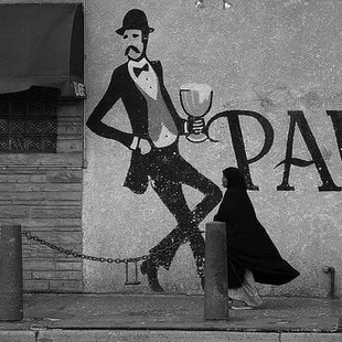 a woman walking down the street