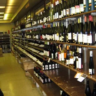 rows of wine bottles on shelves