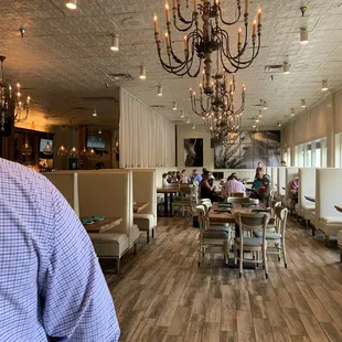 a man standing in a restaurant