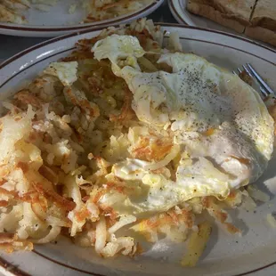8oz NY Strip Steak and eggs w Hash 1/2.
