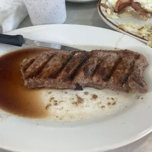 8oz NY Strip Steak and eggs w Hash 2/2.