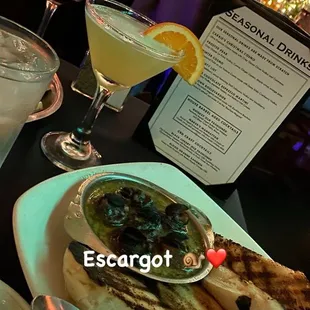 Escargot In Mushroom Caps and a holiday special peach martini house wine