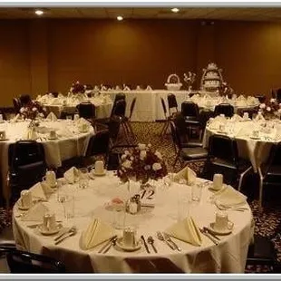 a banquet room set for a wedding