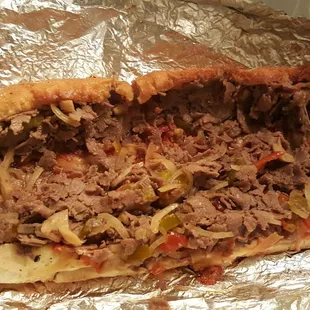 a meat and vegetable sandwich