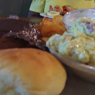 BBQ ribs with potato salad and homemade chips