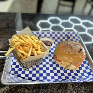 Cheeseburger with fries.