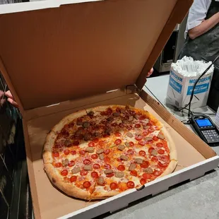 a pizza in a pizza box
