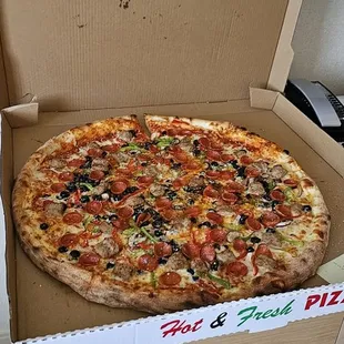 a pizza in a pizza box