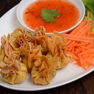 Golden bags : shrimp, pork and chicken filling wrapped with wonton skin