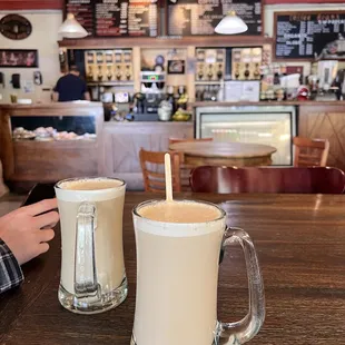 two mugs of coffee on a table