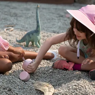 Visitors dig in the Dawn Redwood Courtyard.