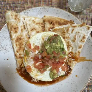 Supposed to be Huevos Rancheros... but... quesadilla with an egg on top.