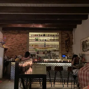 people sitting at the bar