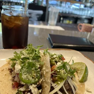 Lamb taco and carna asada tacos