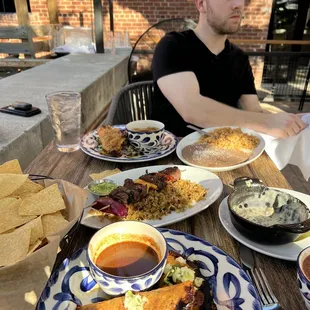 Birria tacos, carne asada skewers, queso