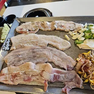 ordered palsaik combo which is pork belly. comes with 8 different styles of pork bellies. the staff cooks for you