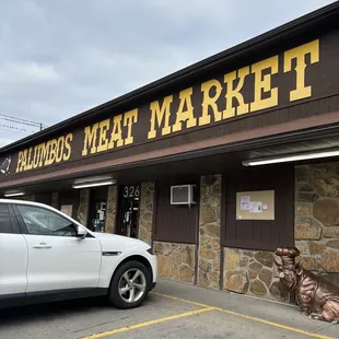 a car parked in front of the building
