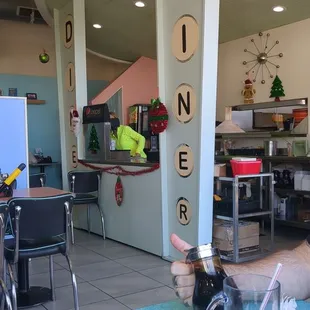 a man sitting at a table with a glass of water
