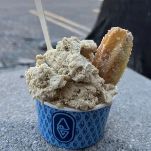 2 scoops (coffee with cognac on top and dulce de leche pampas hidden underneath) with churro