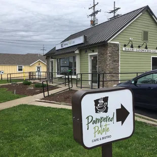 a car parked in front of the restaurant
