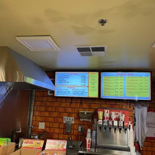 menus on a brick wall