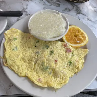 Vegetable omelette and grits.