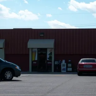 two cars parked in a parking lot