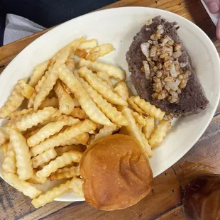Hamburger steak with onions and crinkled cut fries