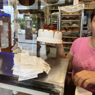 a woman in a bakery