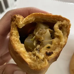 Inside of the chicken Saltenas