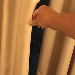 Why are the black out curtains cut?