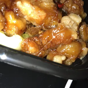 Hair on my order of completely inedible &amp; soggy General Gaus.