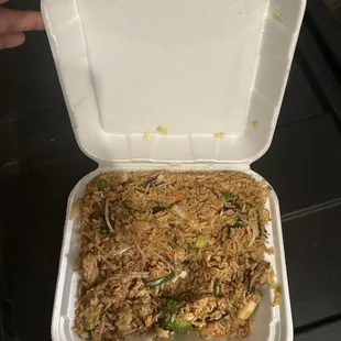 Veggie fried rice  this is a regular portion of vegetable fried rice. Enough for entire family!