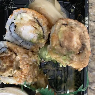 This was my shrimp tempura roll... I couldn't even finish it . The roll was soggy &amp; ROOM TEMPERATURE !! Terrible experience.