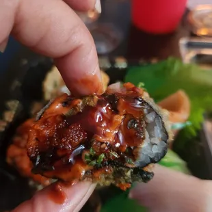 Greasy and burnt volcano roll.